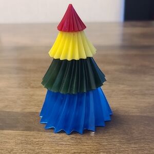 Vibrant Christmas Tree with Red, Yellow, Green, and Blue